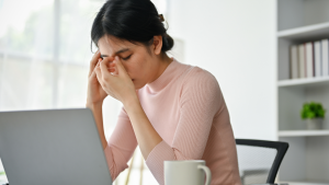 woman stressed at her desk
